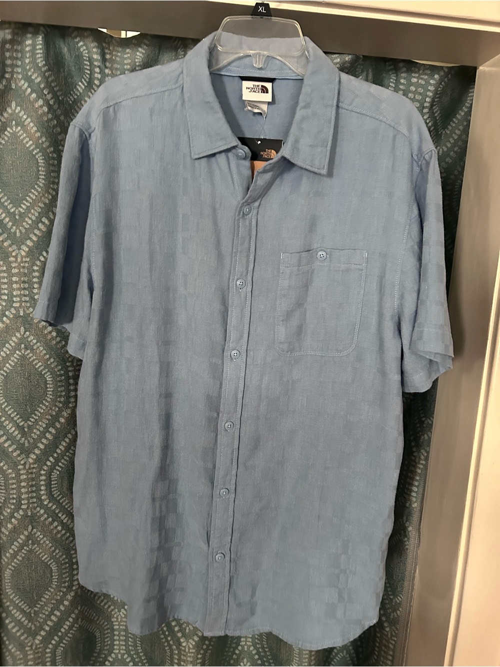 The North Face Men’s Sky Blue Short-Sleeve Button-Down Shirt: cotton and hemp!